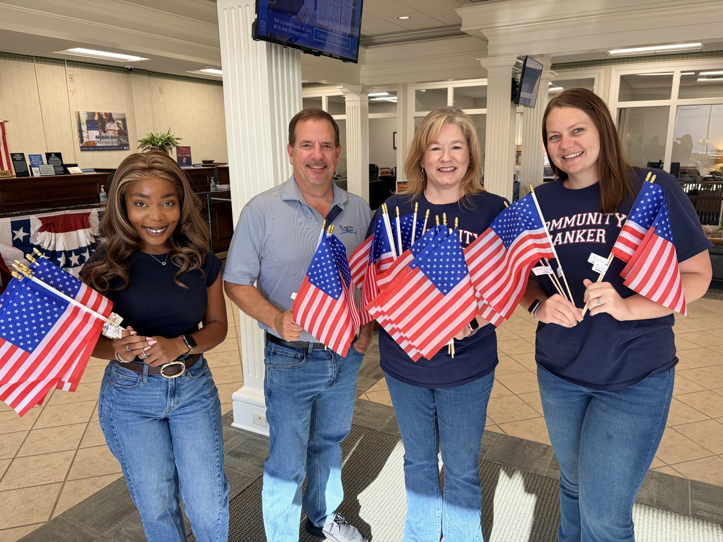 PFB team holding American flags